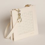 Petit cabas rose très pâle en cuir de buffle et jacquard blanc cassé